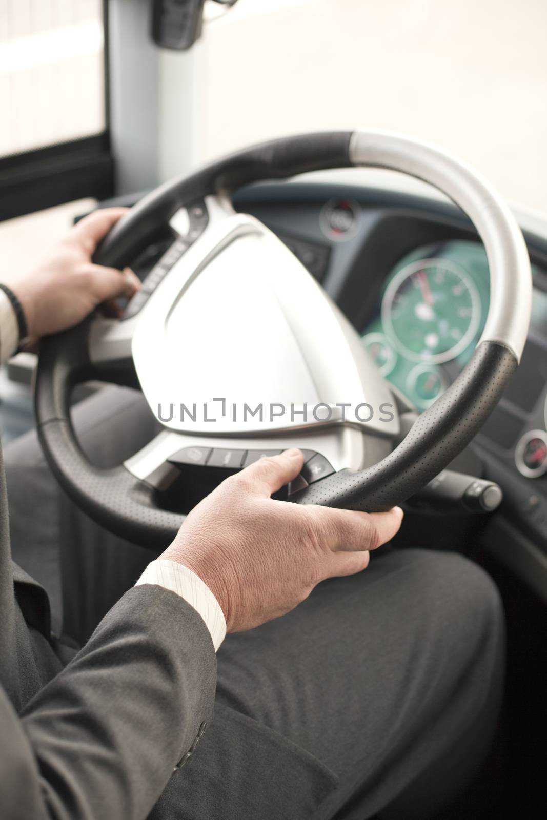 Man driving a bus