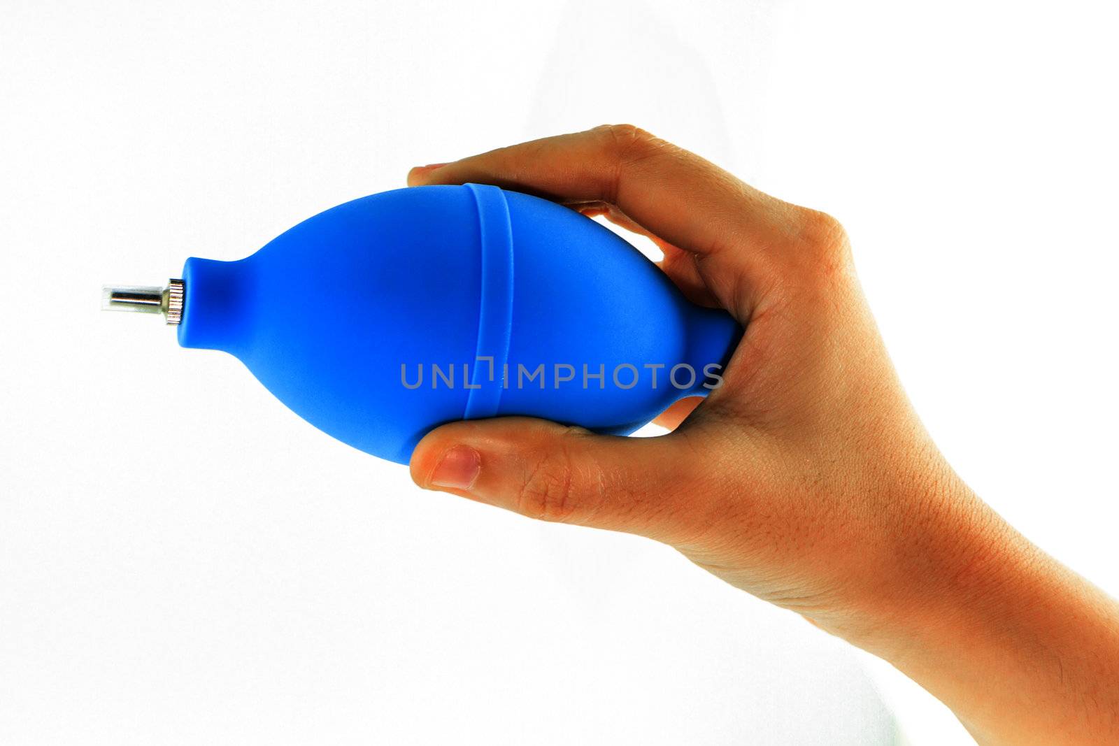 hand with air blower for cleaning camera by bunwit