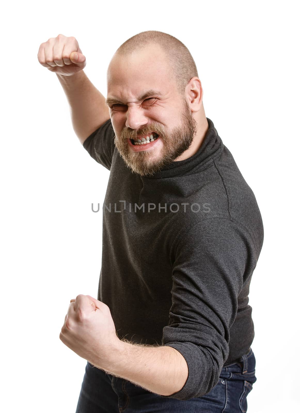 angry bearded man attacked with fists