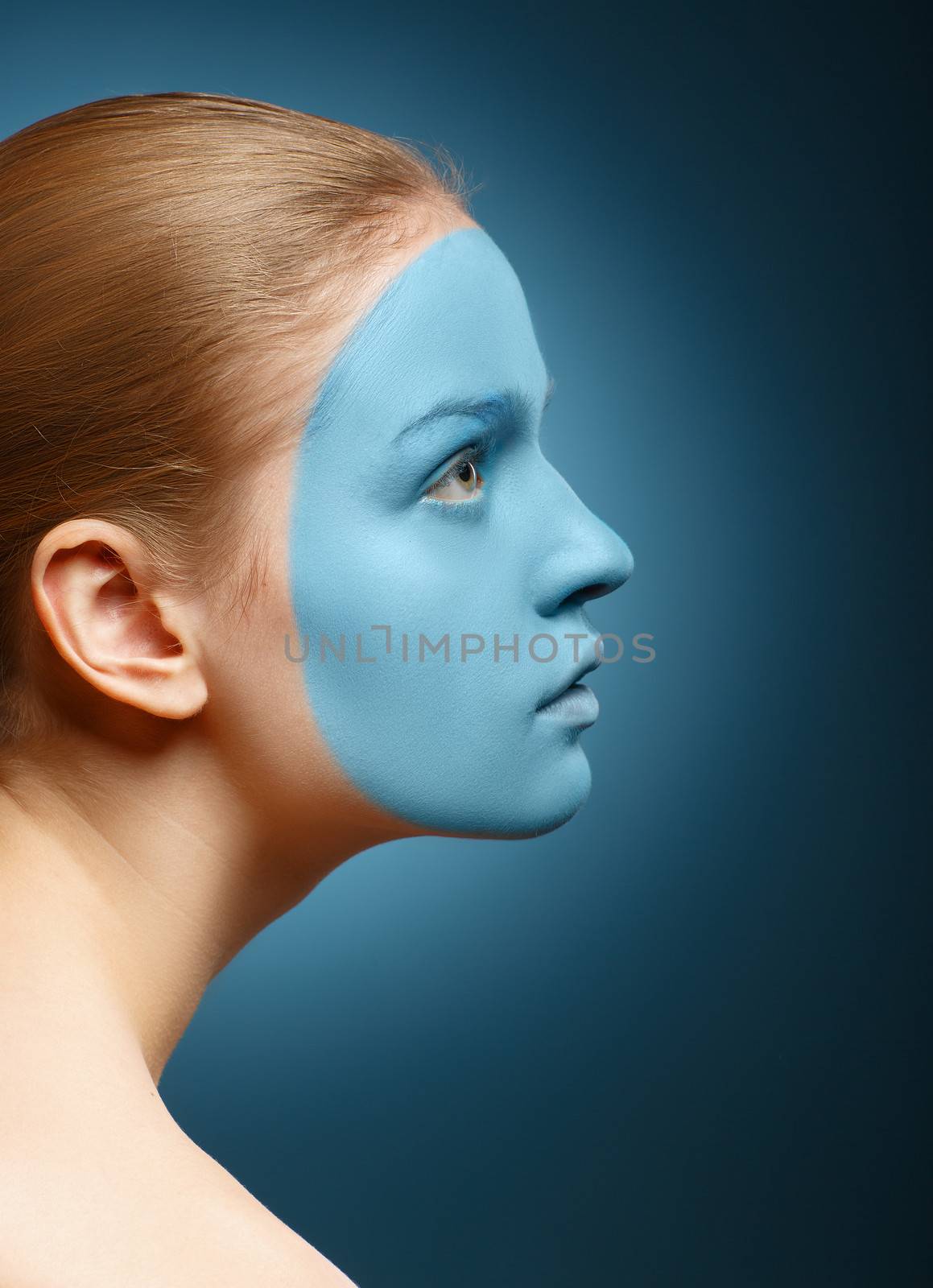 Young girl with facial mask. Medical or sports theme.
