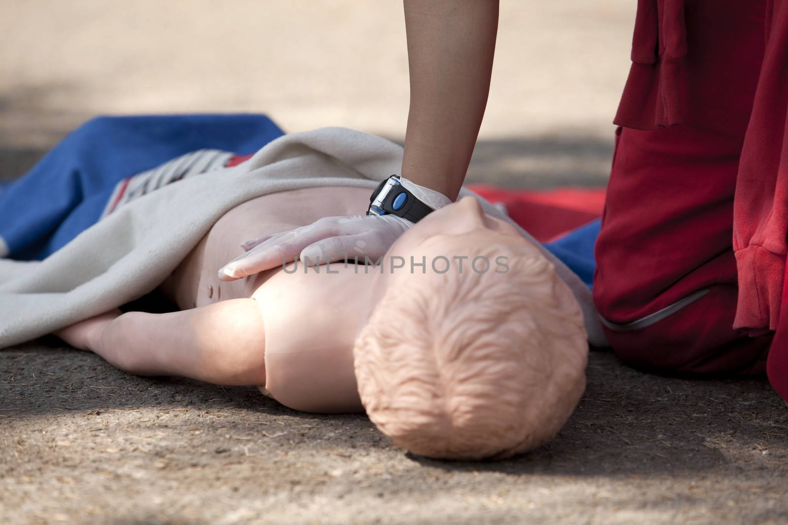 Chest compressions on a dummy