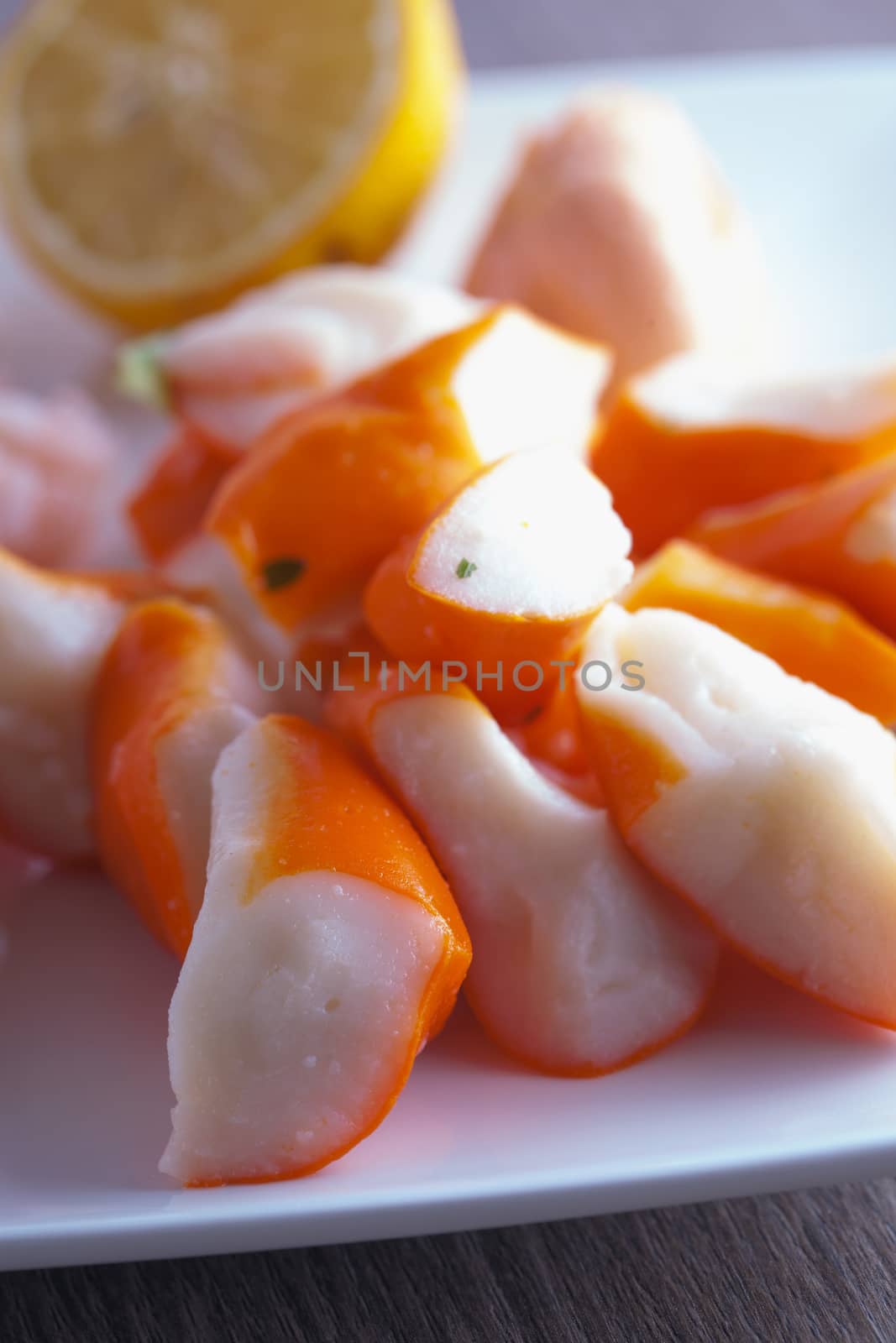 Surimi in close up over a white plate