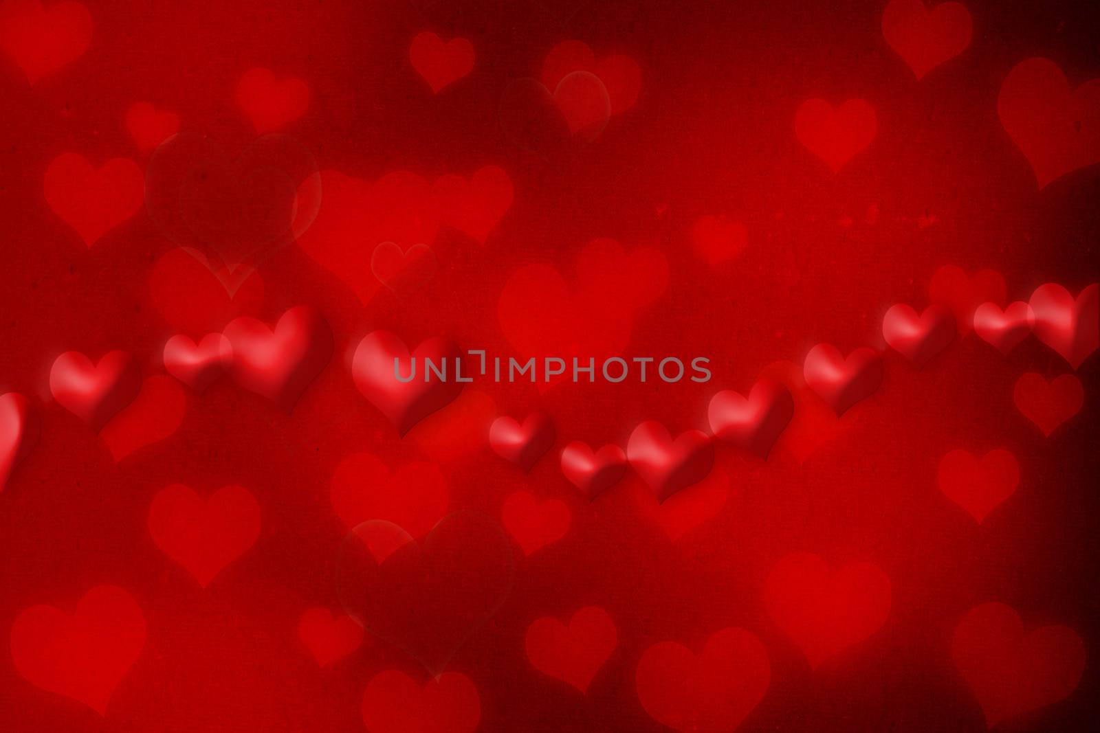 Red hearts on red grunge paper background