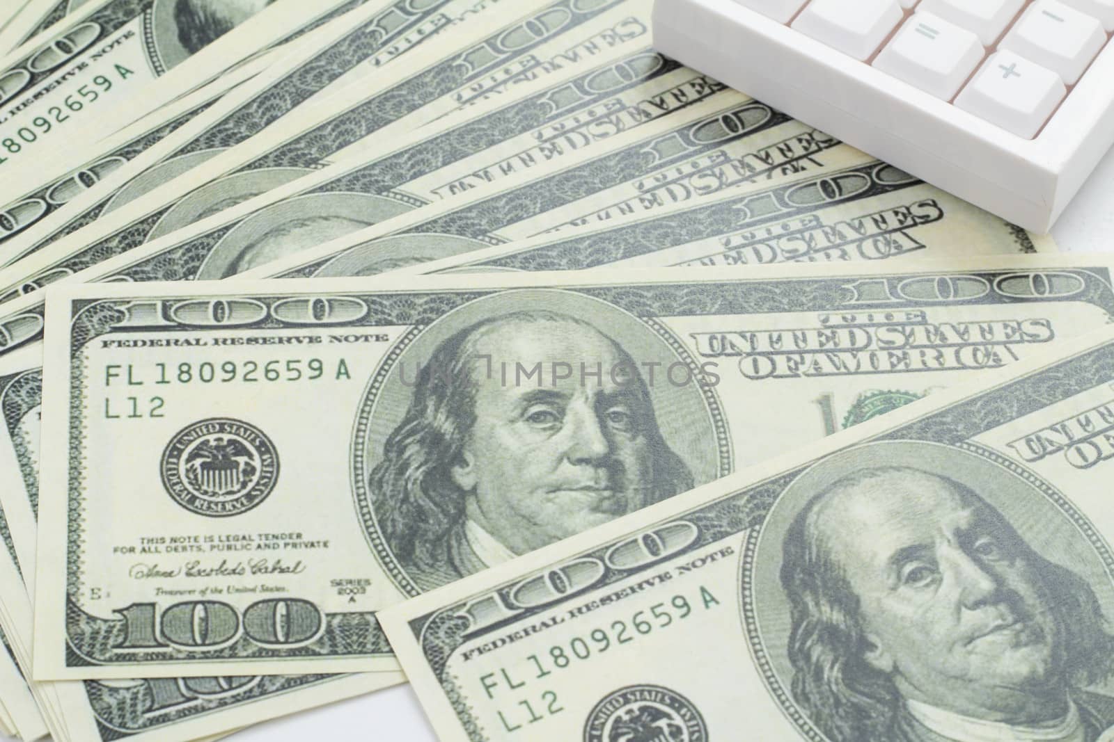 US bank note and calculator on white background