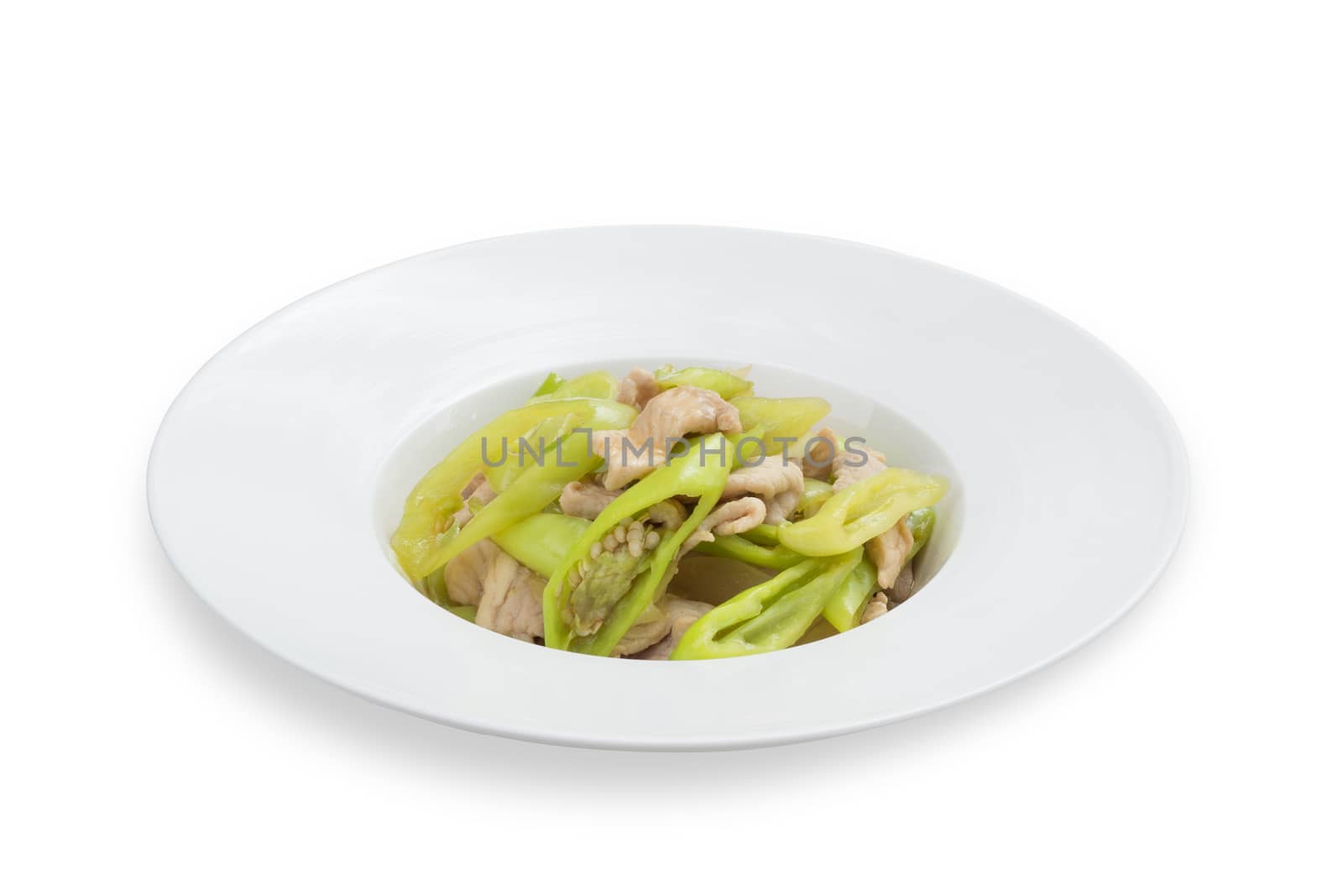 pork fried with sweet pepper. Thai food on white dish