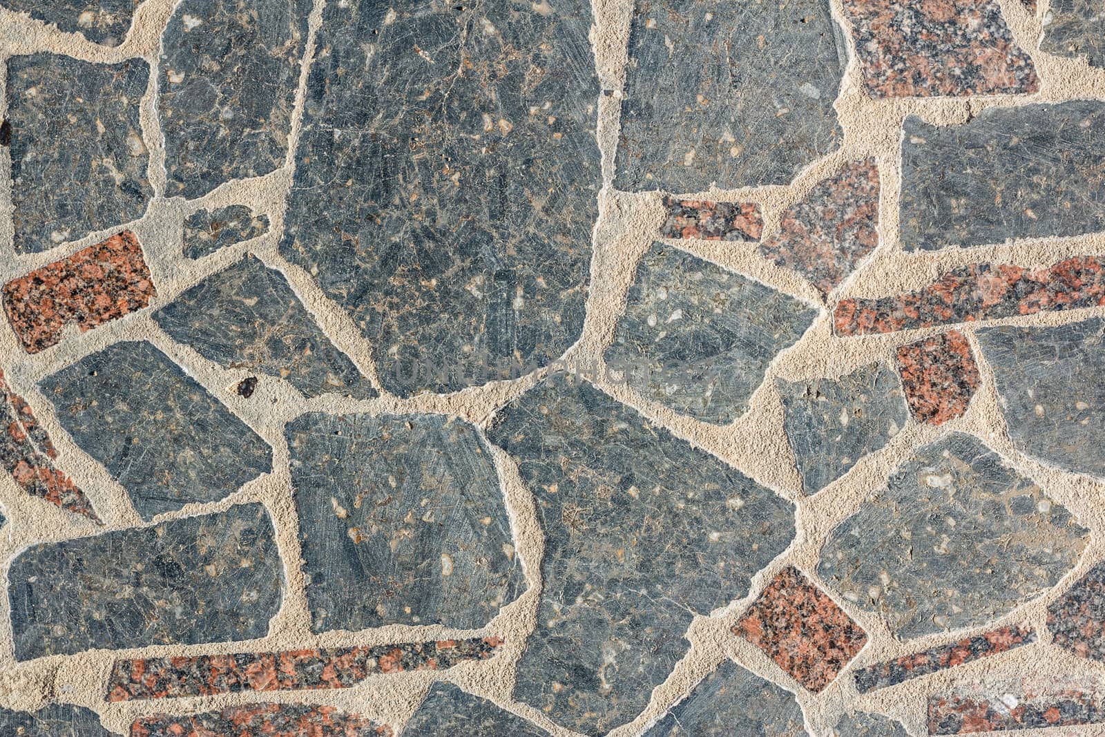 Pieces of granite tiles stacked on the street, shot in the afternoon