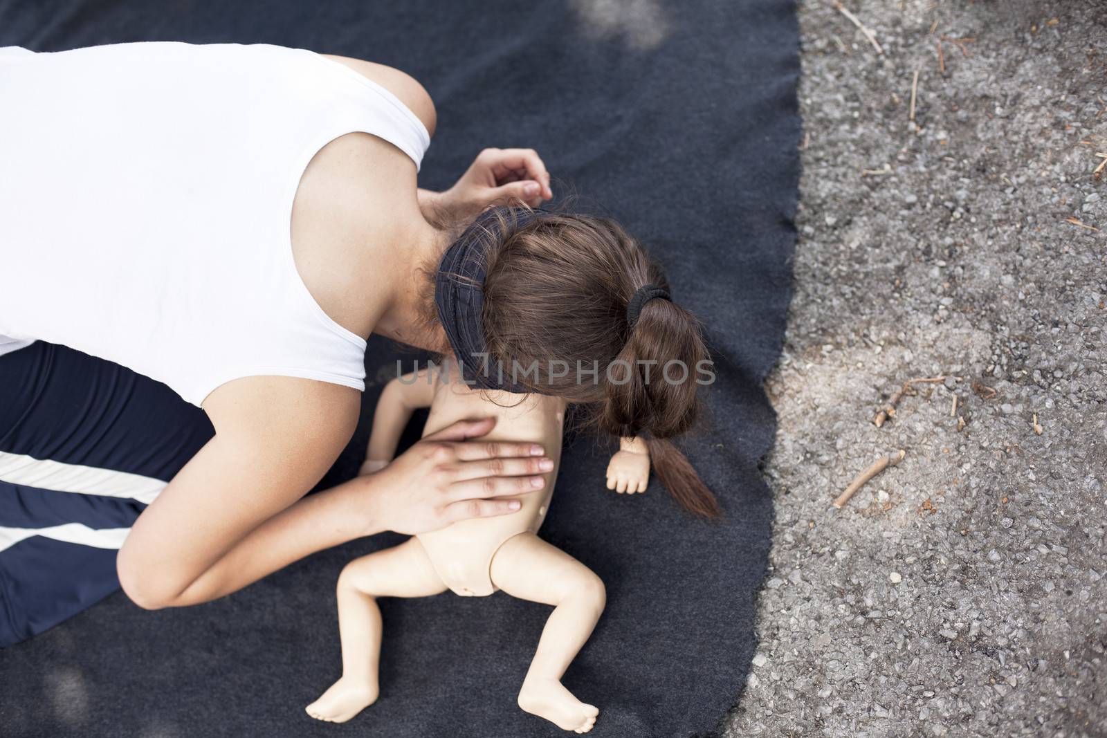 Infant dummy first aid by wellphoto