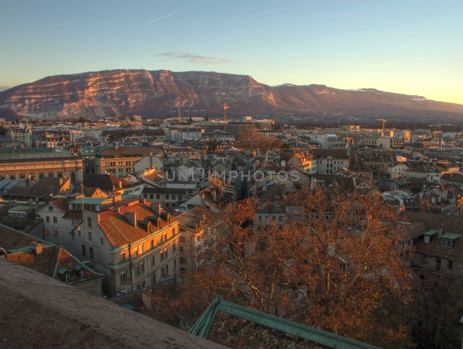 View on Geneva city and Saleva mountain by sunset from Saint-Pierre cathedral, Switzerland (HDR)