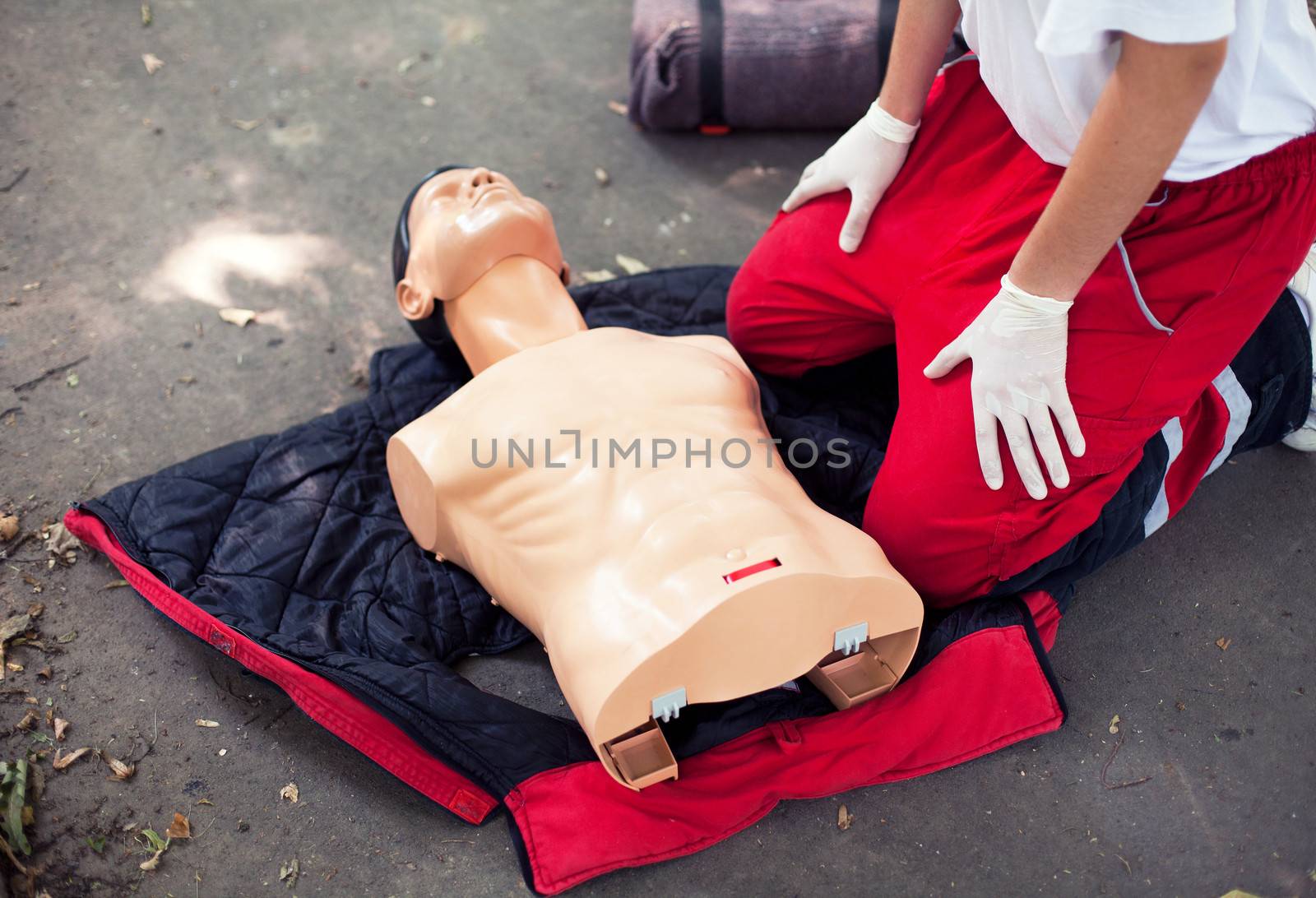 Demonstrating CPR on a dummy