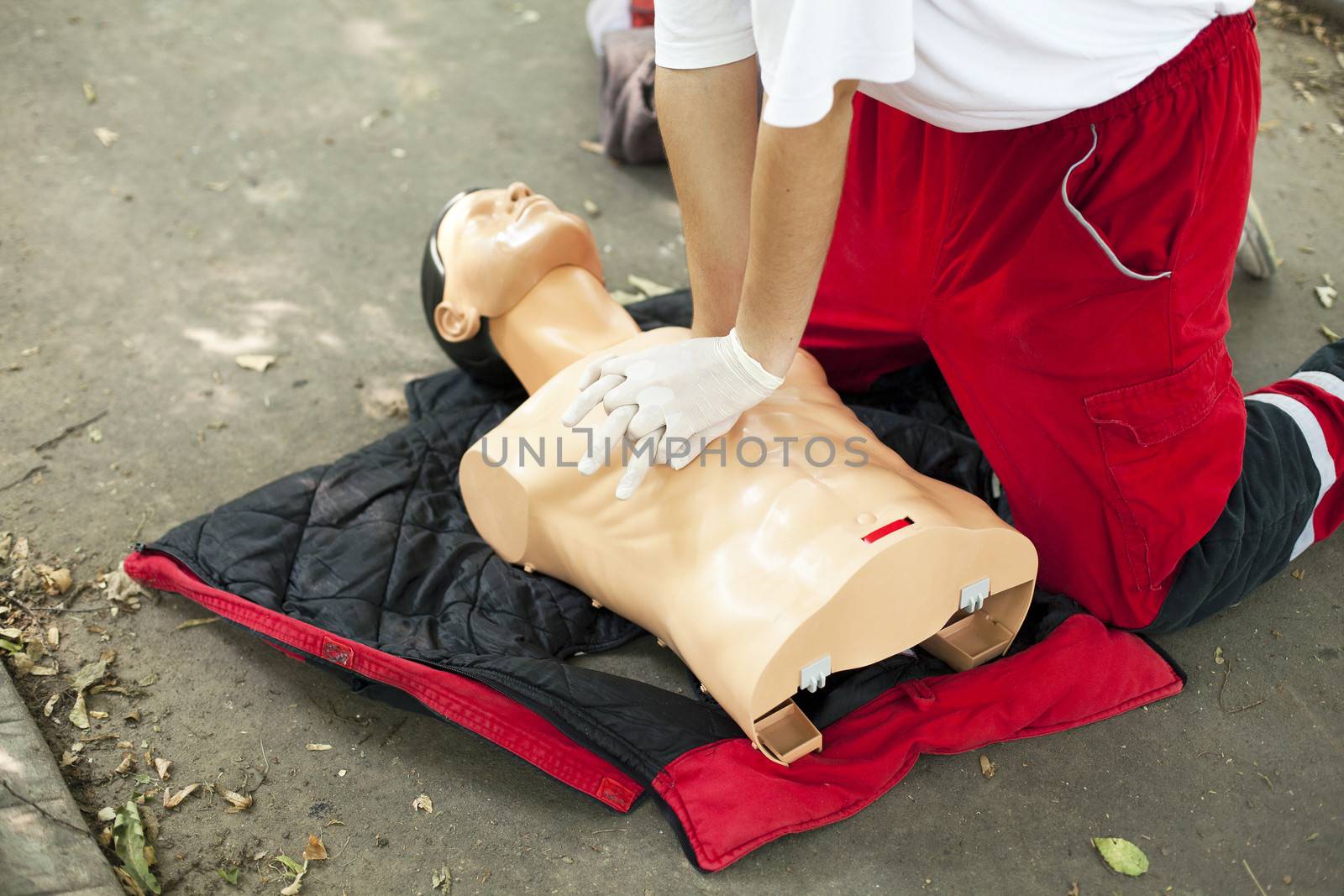 Demonstrating CPR on a dummy