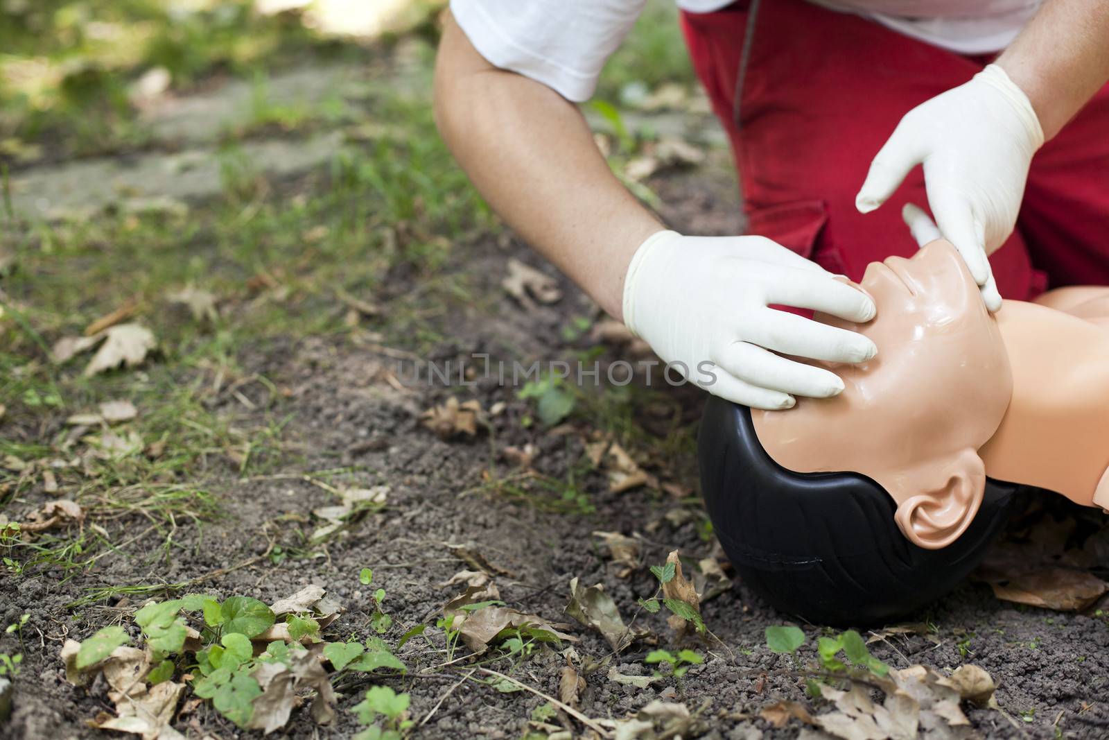 Demonstrating CPR on a dummy