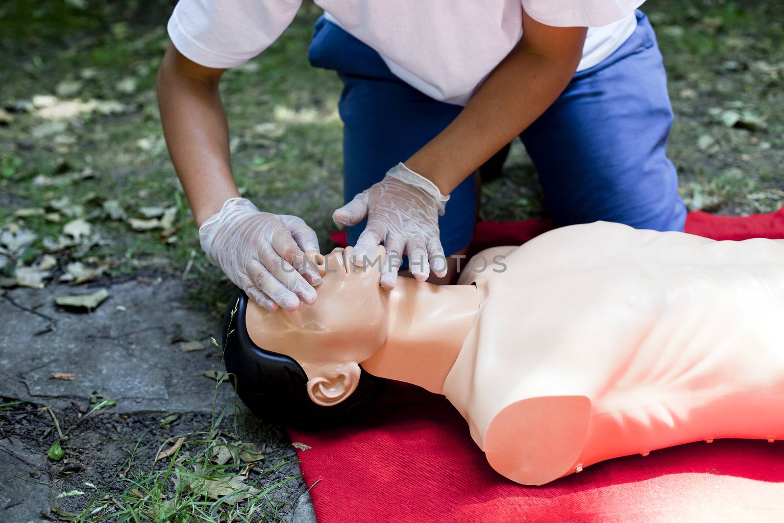 Demonstrating CPR on a dummy