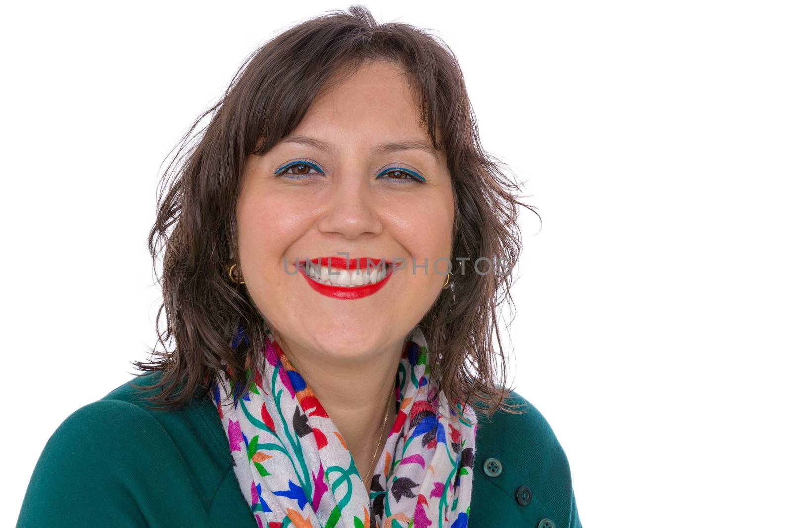 Middle aged businesswoman in shirt and scarf looking at your eyes with benignly with warm smile