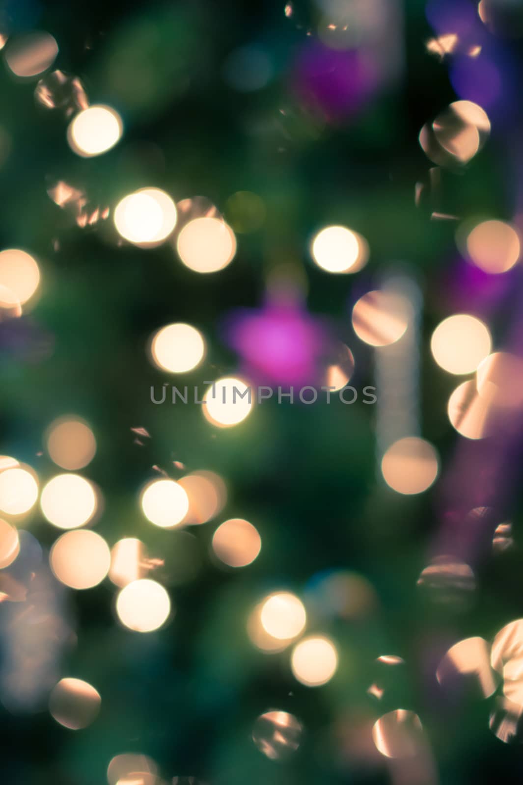 Abstract holiday background with blurred Christmas lights and festive bokeh