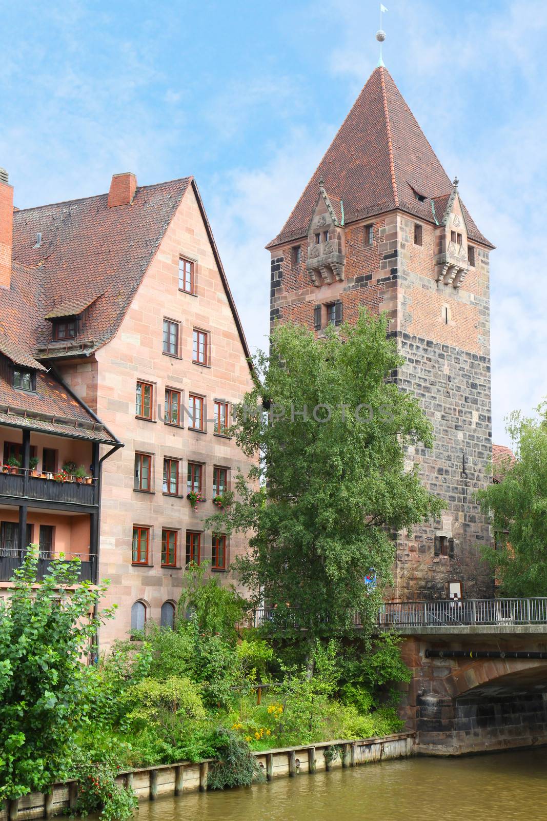 Vordere Insel Schütt, Schuldturm Tower or Debtors Prison and Heubrücke Bridge over the River Pegnitz in Nuremberg, Middle Franconia, Bavaria, Germany, Central Europe.