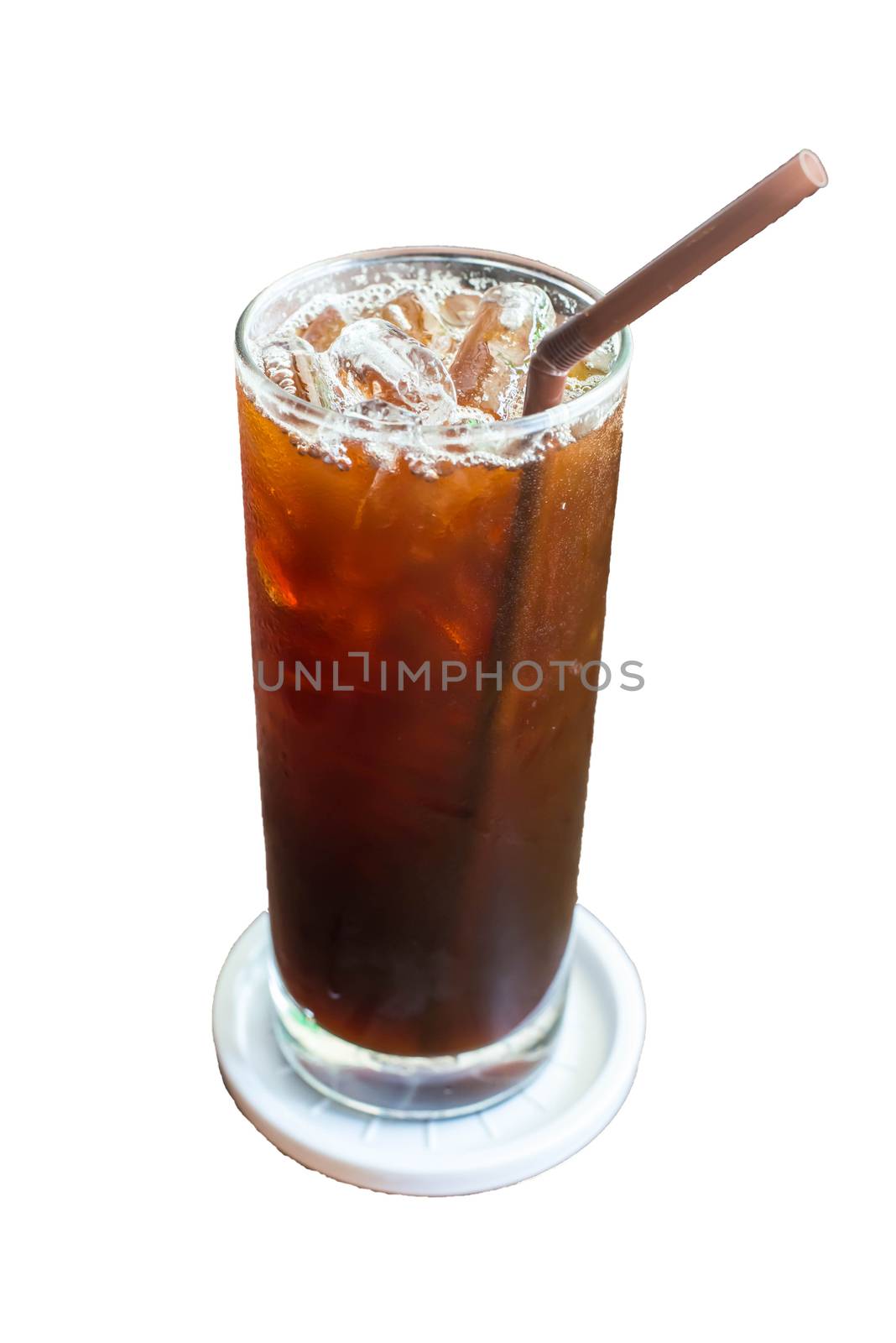 Iced black coffee on the wooden table in coffee cafe.