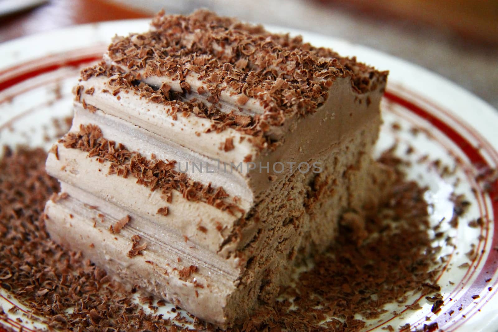 Chocolate ice cream and hardered chocolate over