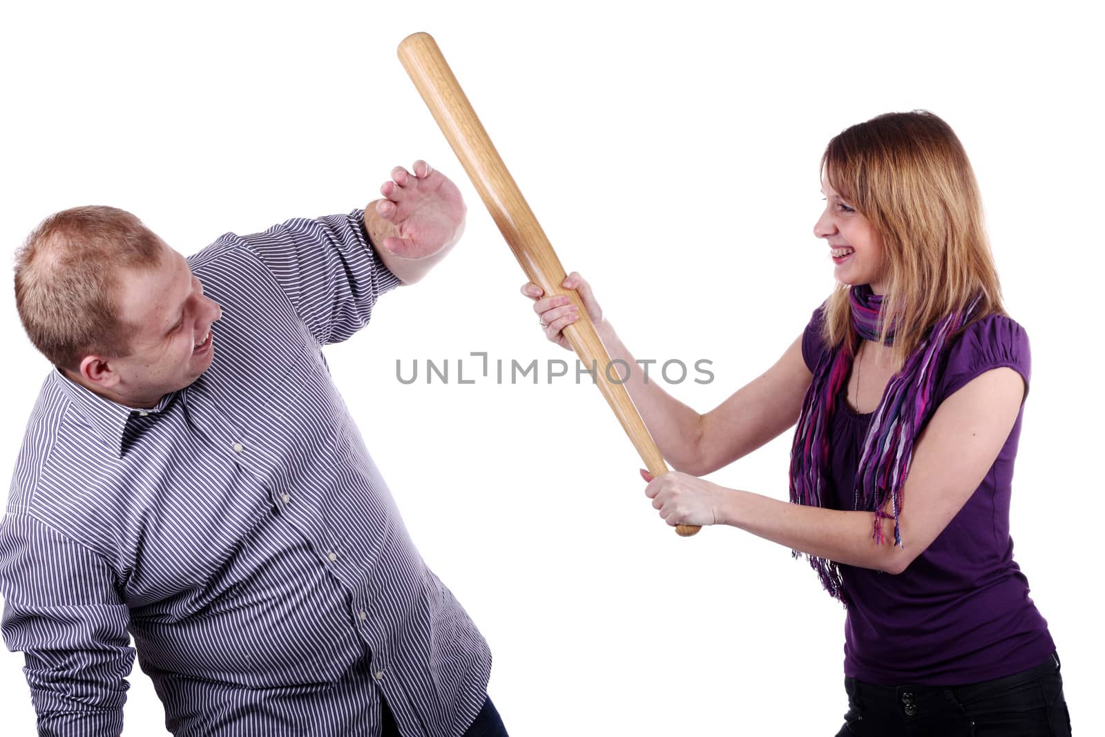 Young man and girl joking isolated on the white background