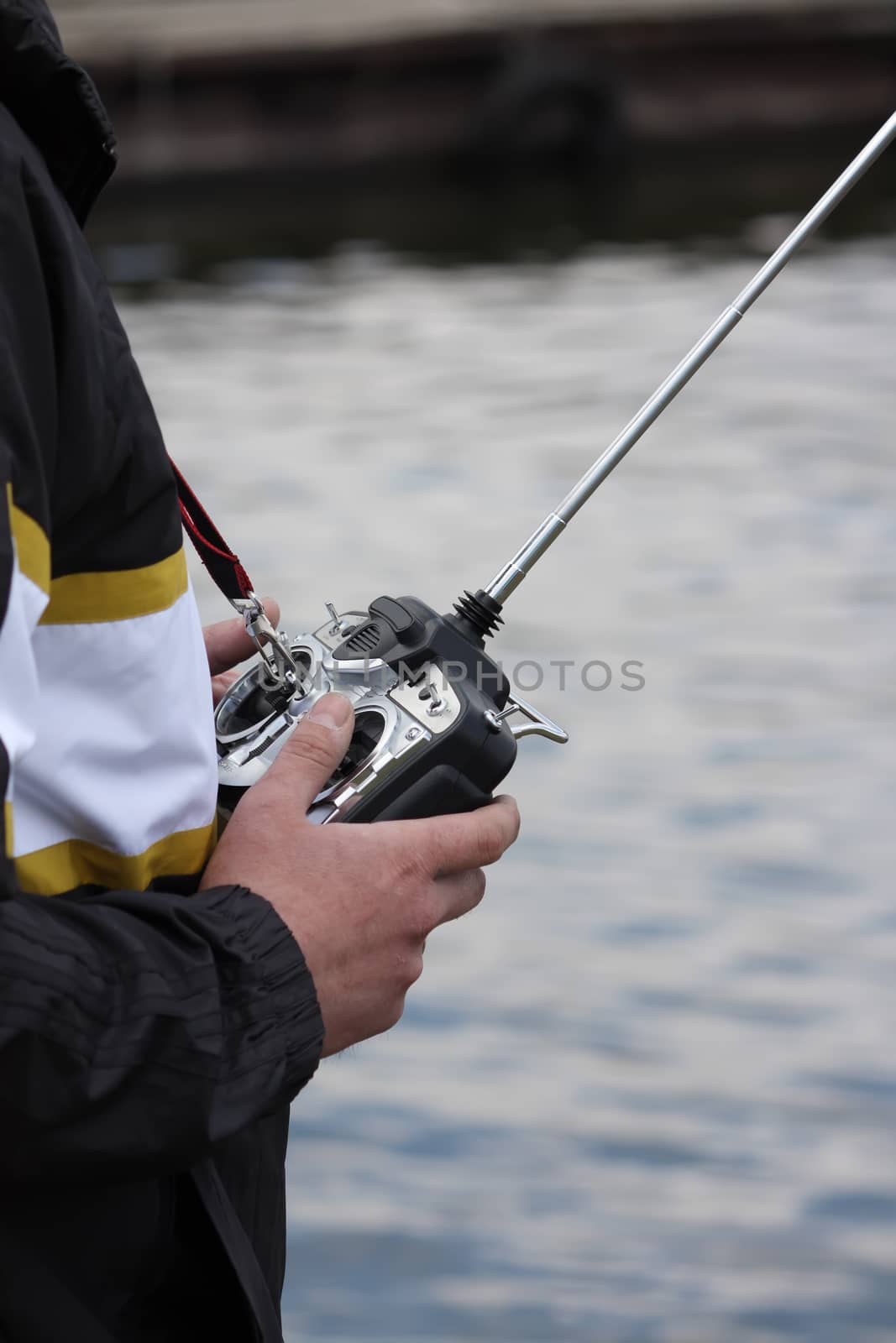 A man holding remote control in a hands