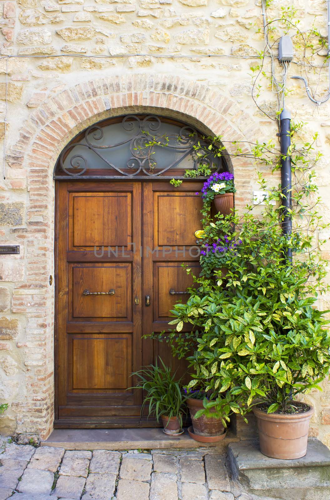 lovely tuscan doors, Volterra, Italy by miradrozdowski