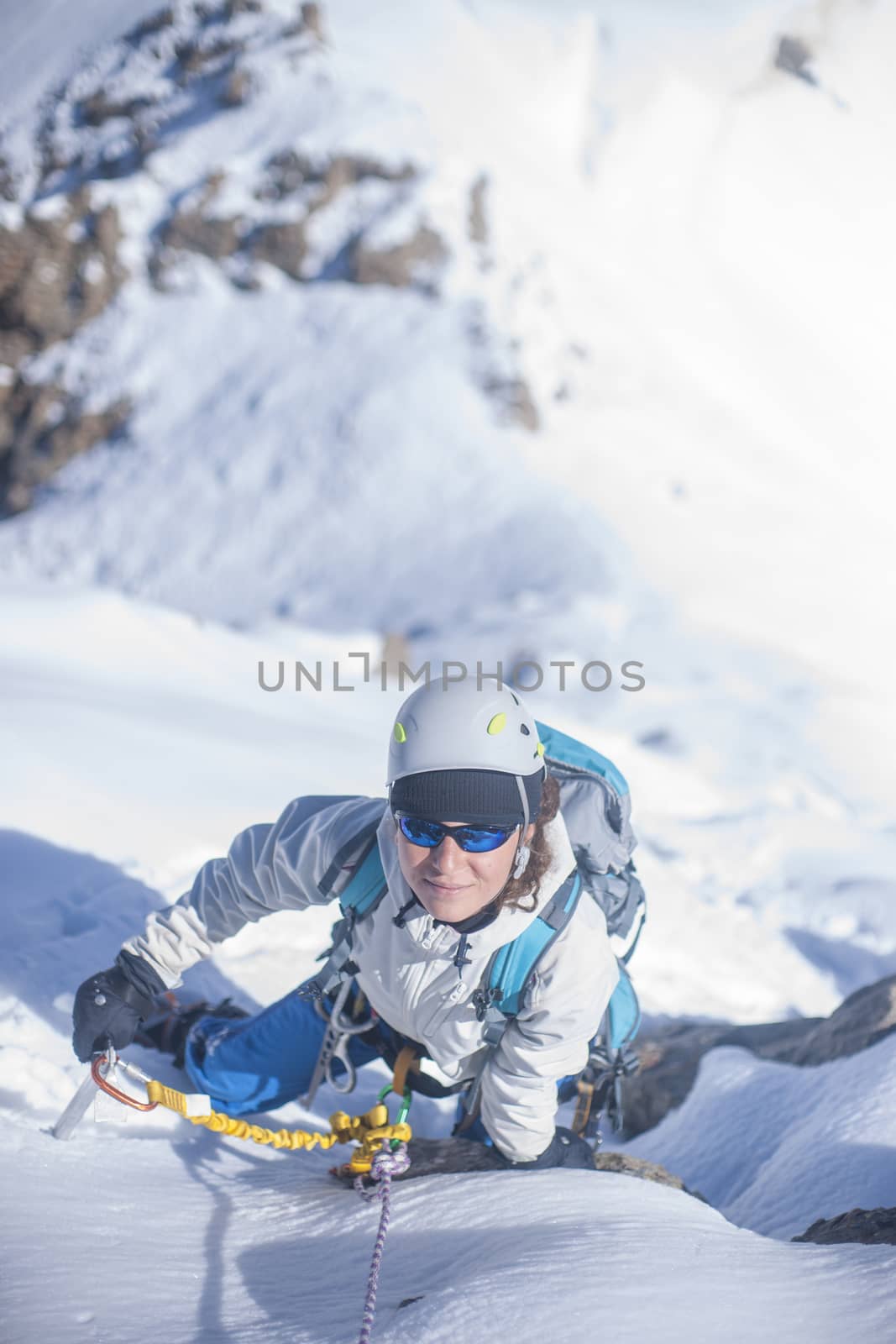 Girl clumb up on the ice by kozak