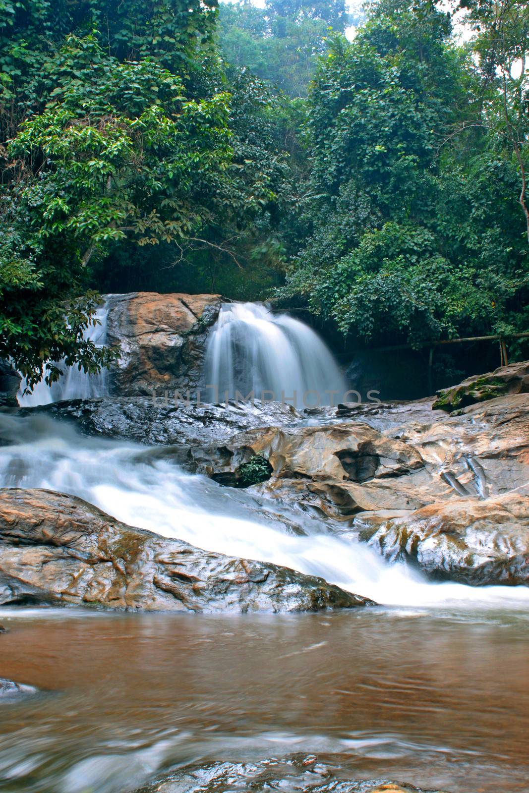 Waterfall in The forest at Chiang Mai , Thailand