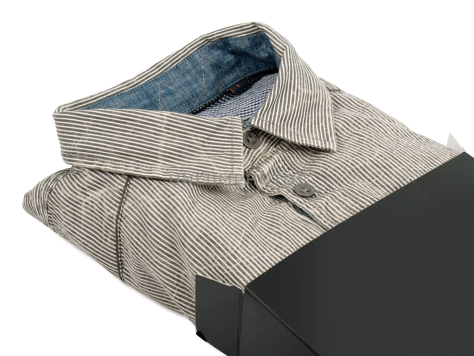 man's shirt in black gift box, isolated on white