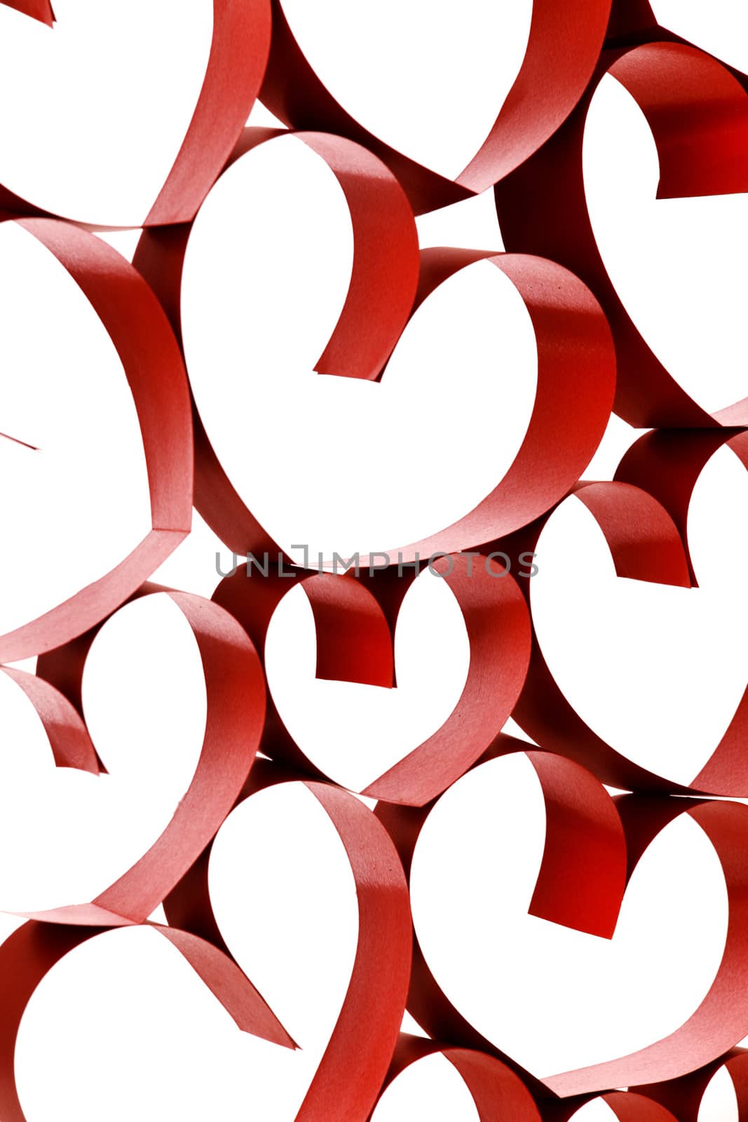 Red ribbon hearts decoration on white background