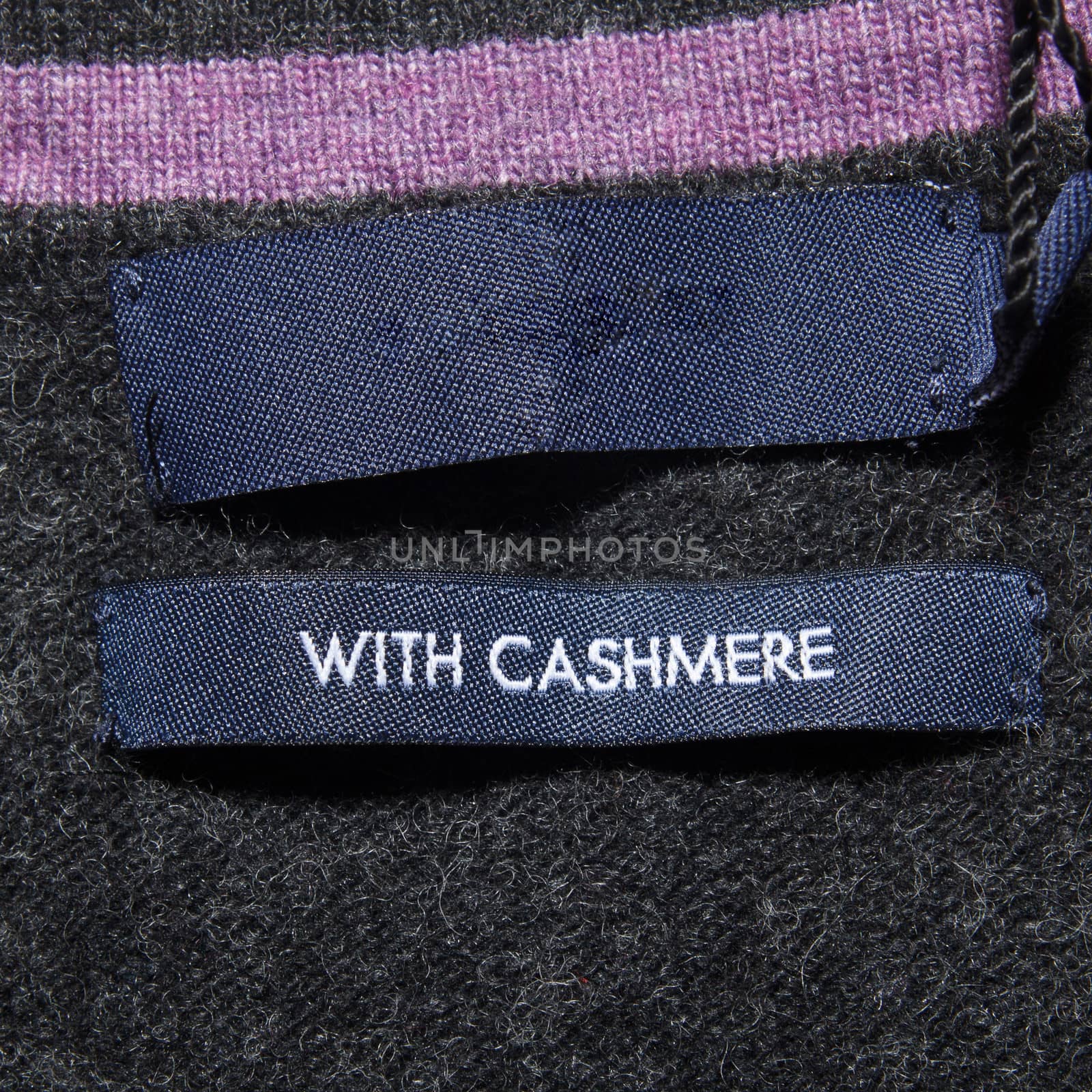 With cashmere label on wool jumper