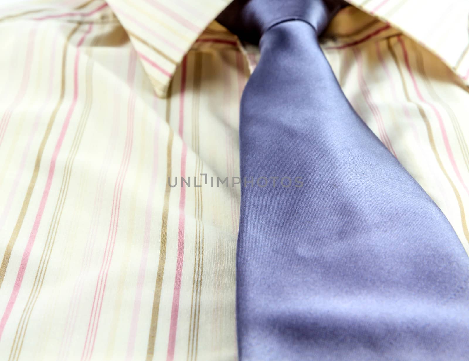 man's shirt and blue tie isolated