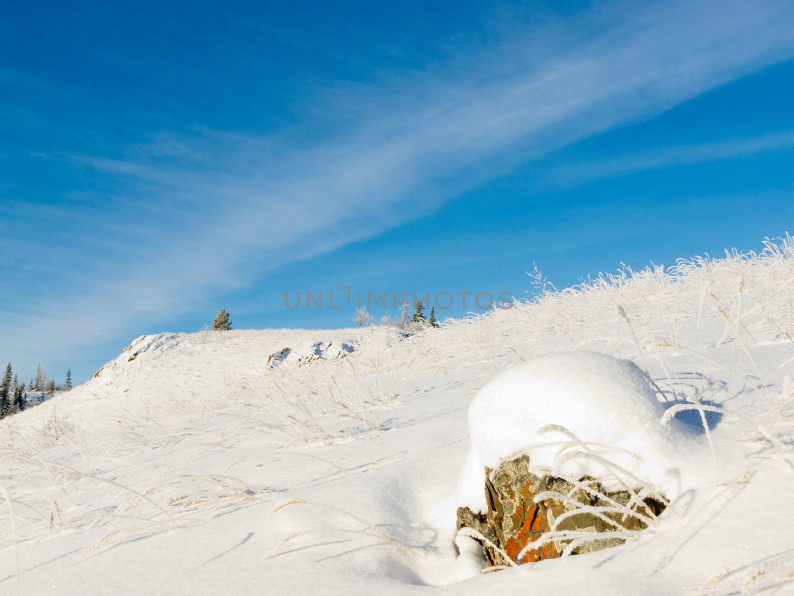 Rocky hillside snow covered winter wonderland by PiLens