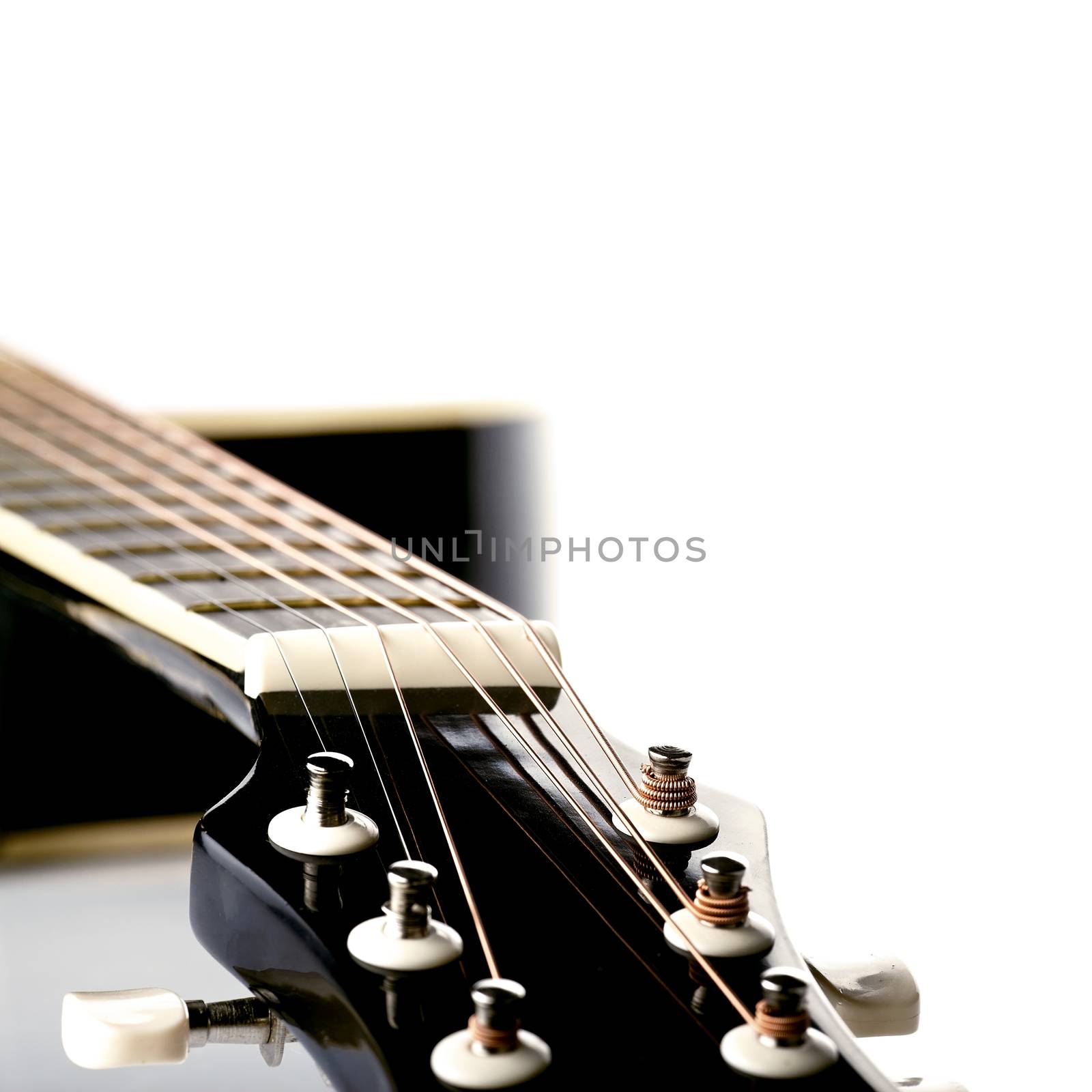 Musical instrument. Detail of a musical instrument. Strings on a guitar.