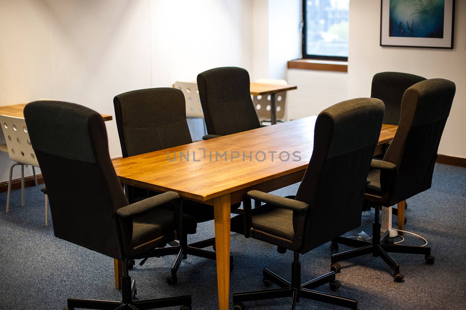 Modern office meeting room by stockyimages