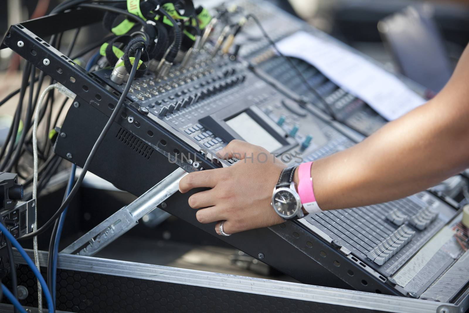 Sound control engineer in outdoor concert event