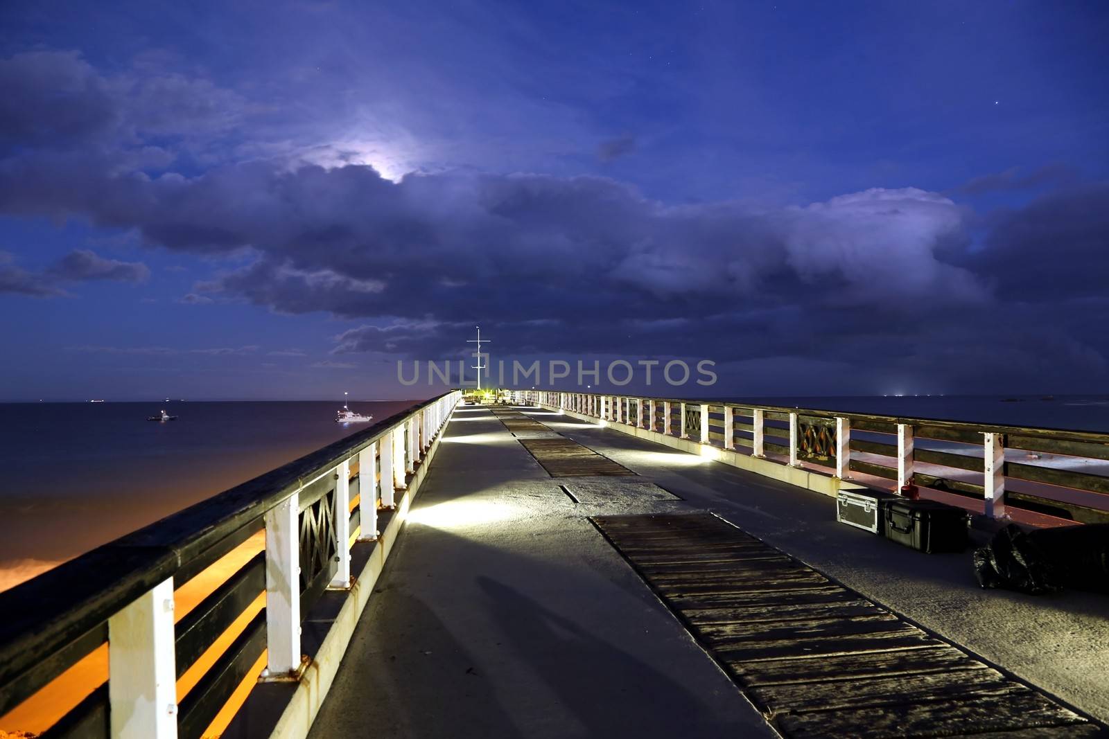 Beach Pier at Night by fouroaks