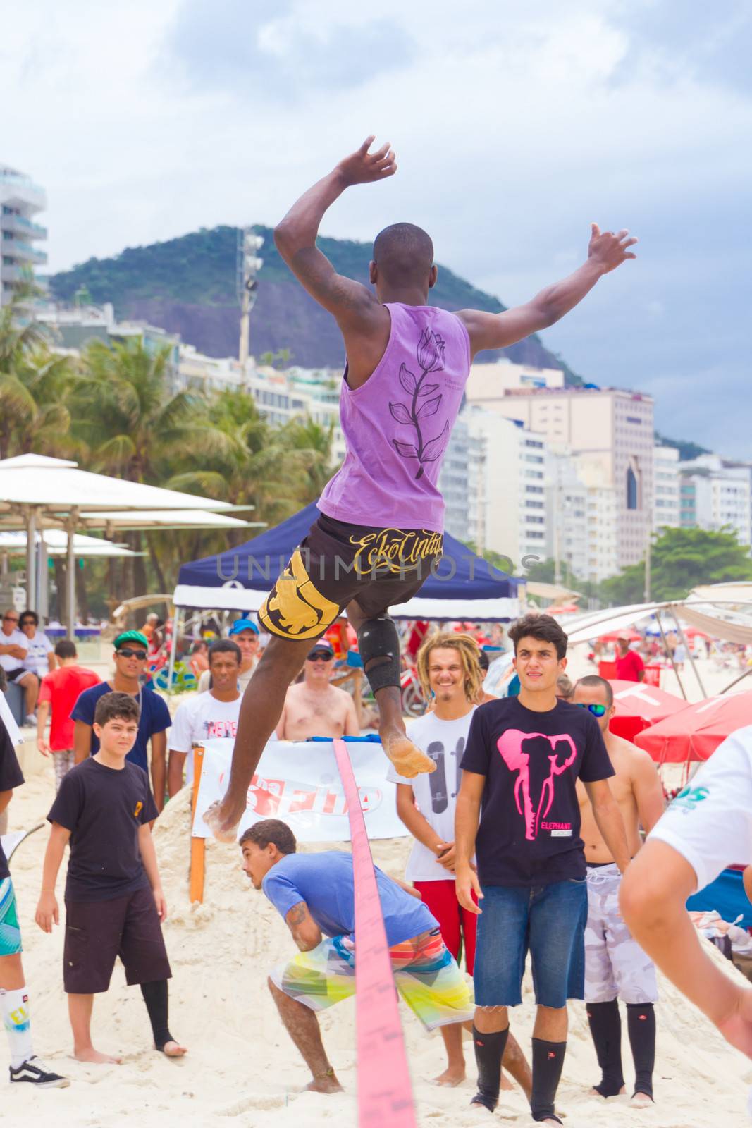 RIO DE JANEIRO - NOVEMBER 03 2012: Slackline contestant on the sands of Copacabana in Rio Elephant Cup tournament, held on November  03, 2012 on Copacabana, Rio de Janeiro, Brazil.