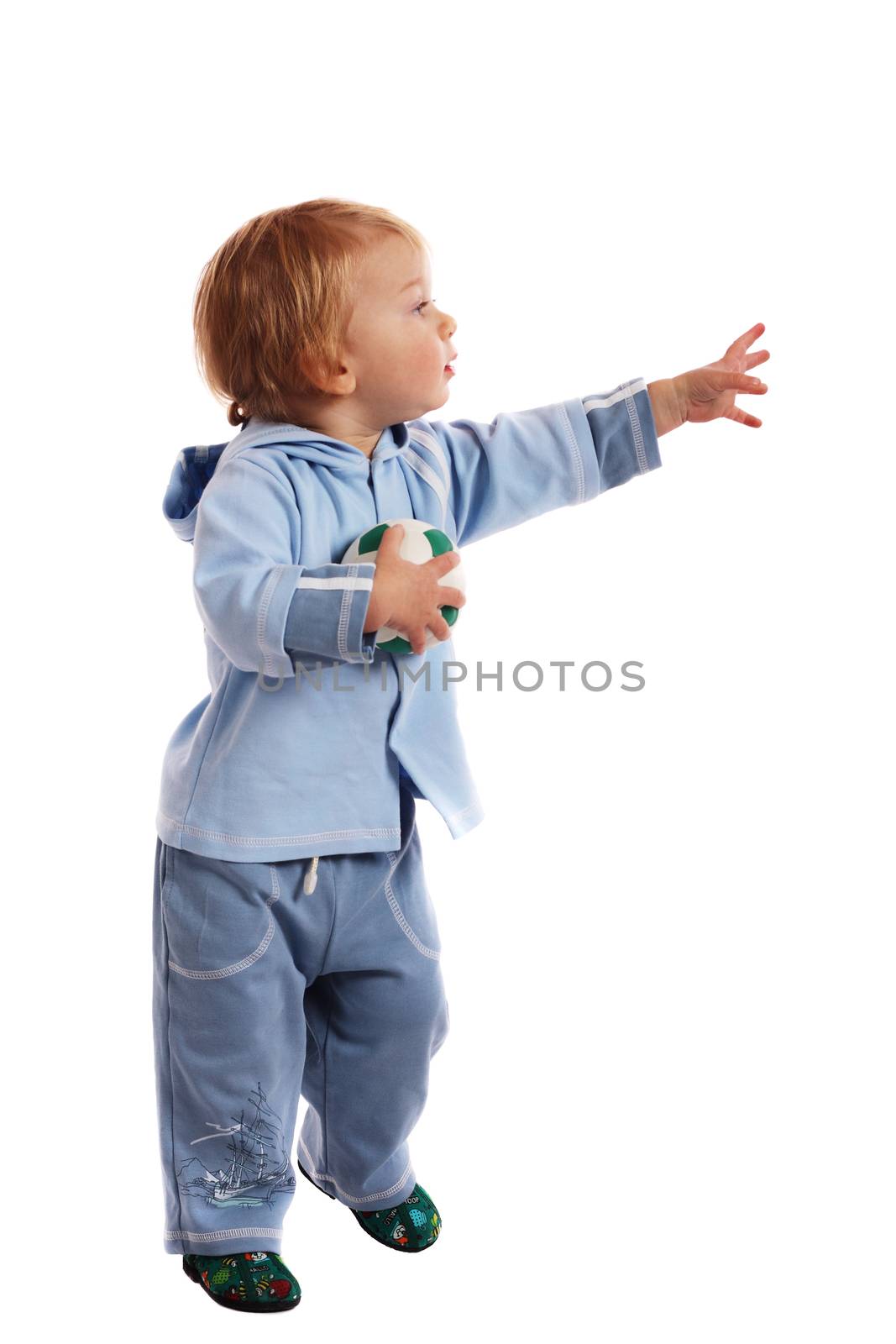 Little boy hold a soccer ball in his hands