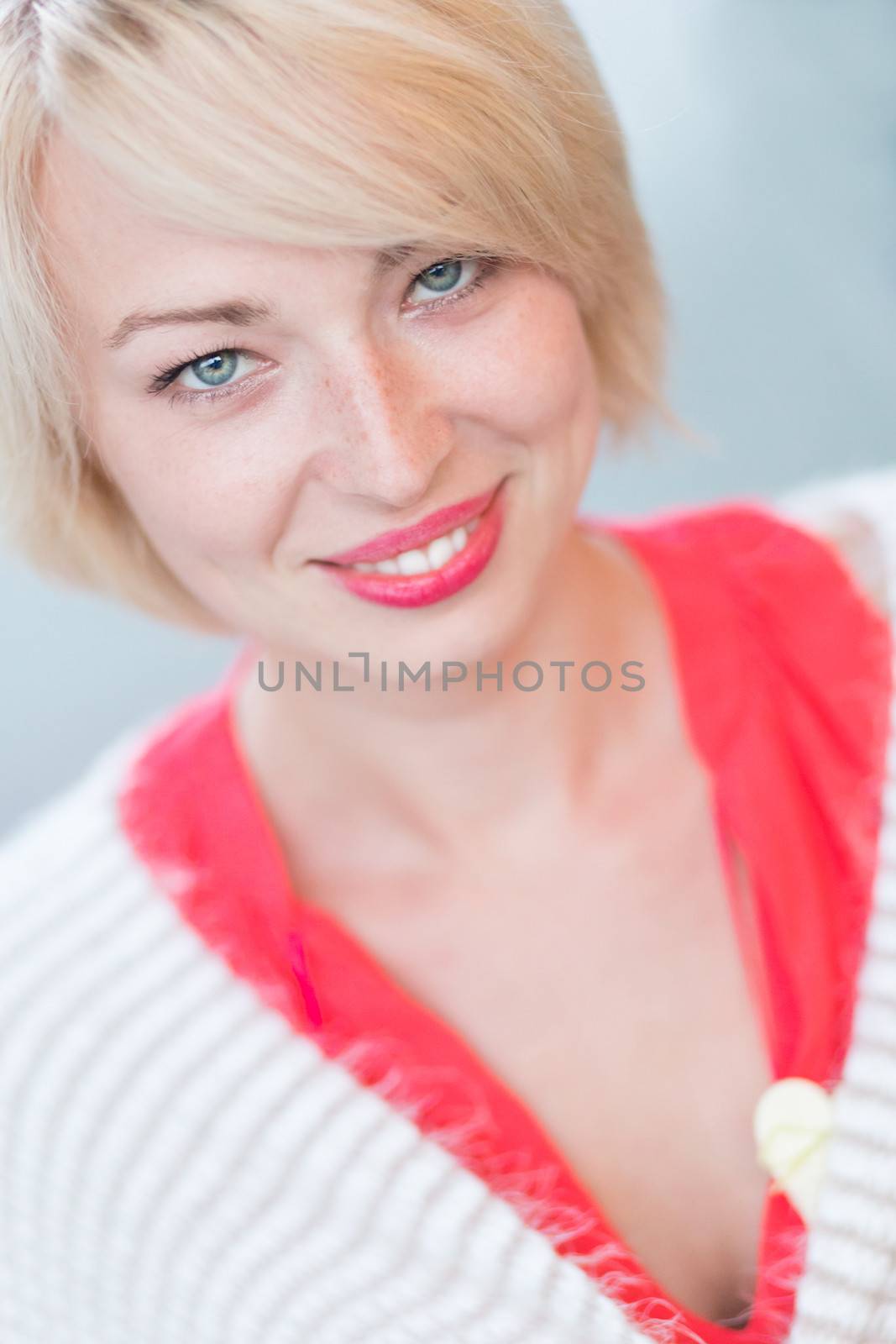 Portrait of casually dressed young attractive woman.