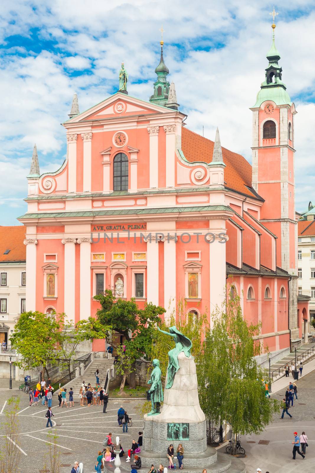 Romantic Ljubljana's city center:  river Ljubljanica, Triple Bridge (Tromostovje), Preseren square and Franciscan Church of the Annunciation; Ljubljana, Slovenia, Europe.