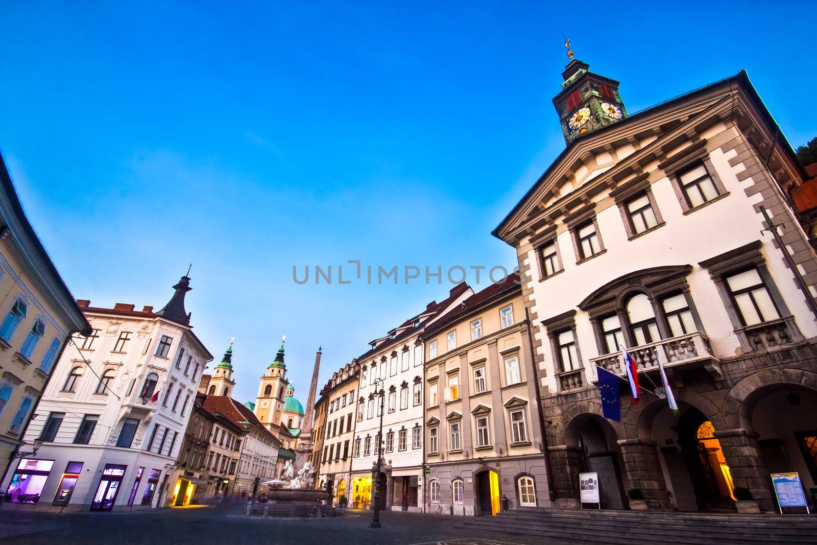 Evening panoramic view of Ljubljana's historic city center and the town hall.