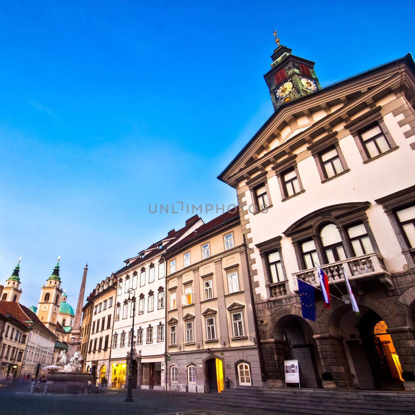 Evening panoramic view of Ljubljana's historic city center and the town hall.