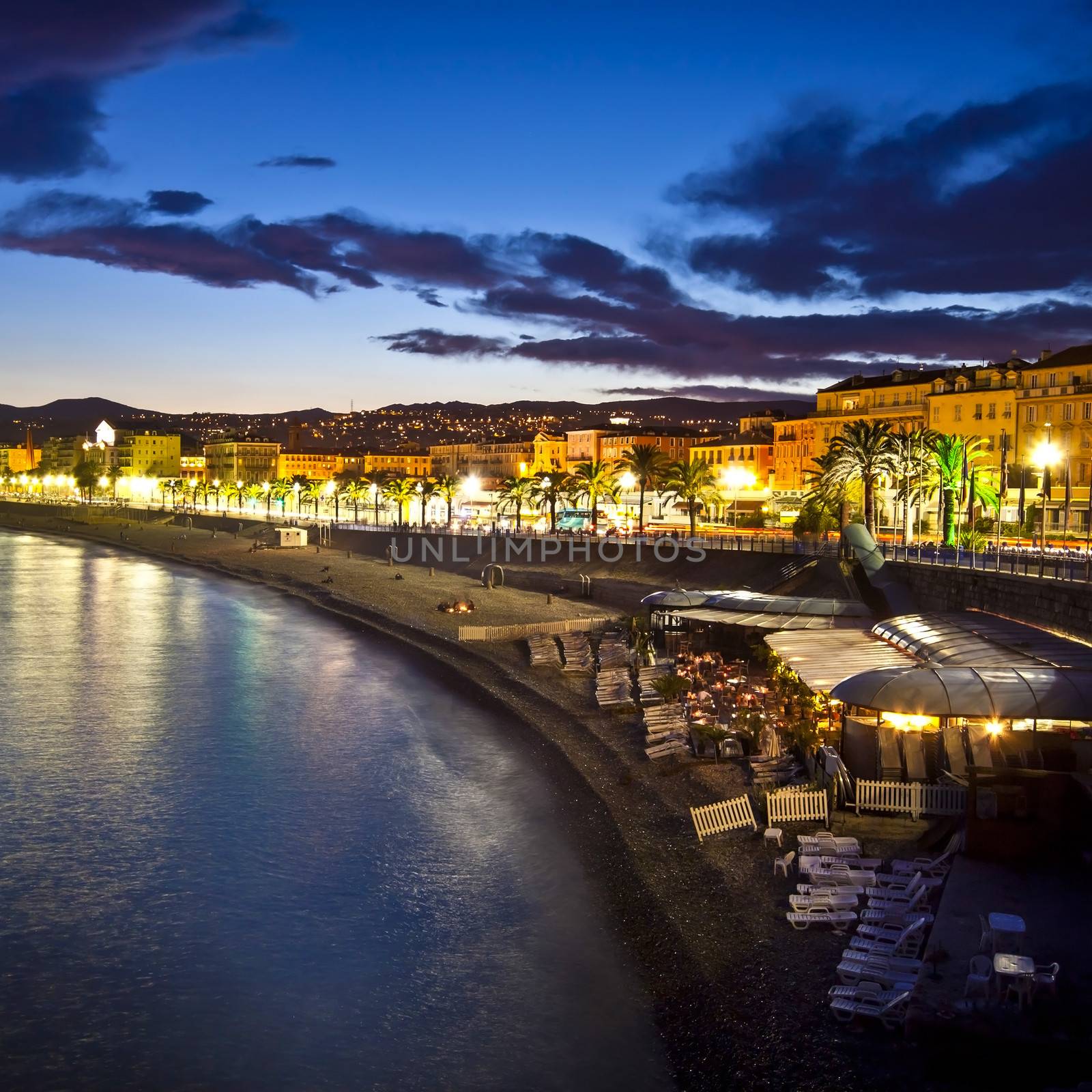 The beach and the waterfront of Nice at night, France.