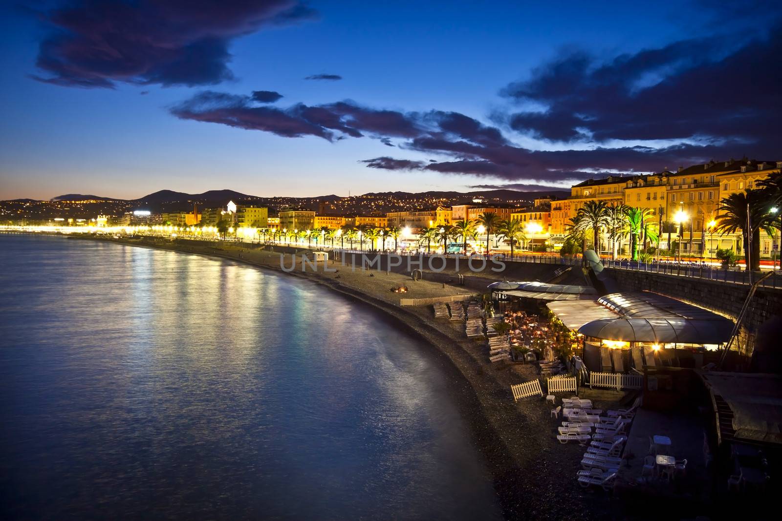 The beach and the waterfront of Nice at night, France.