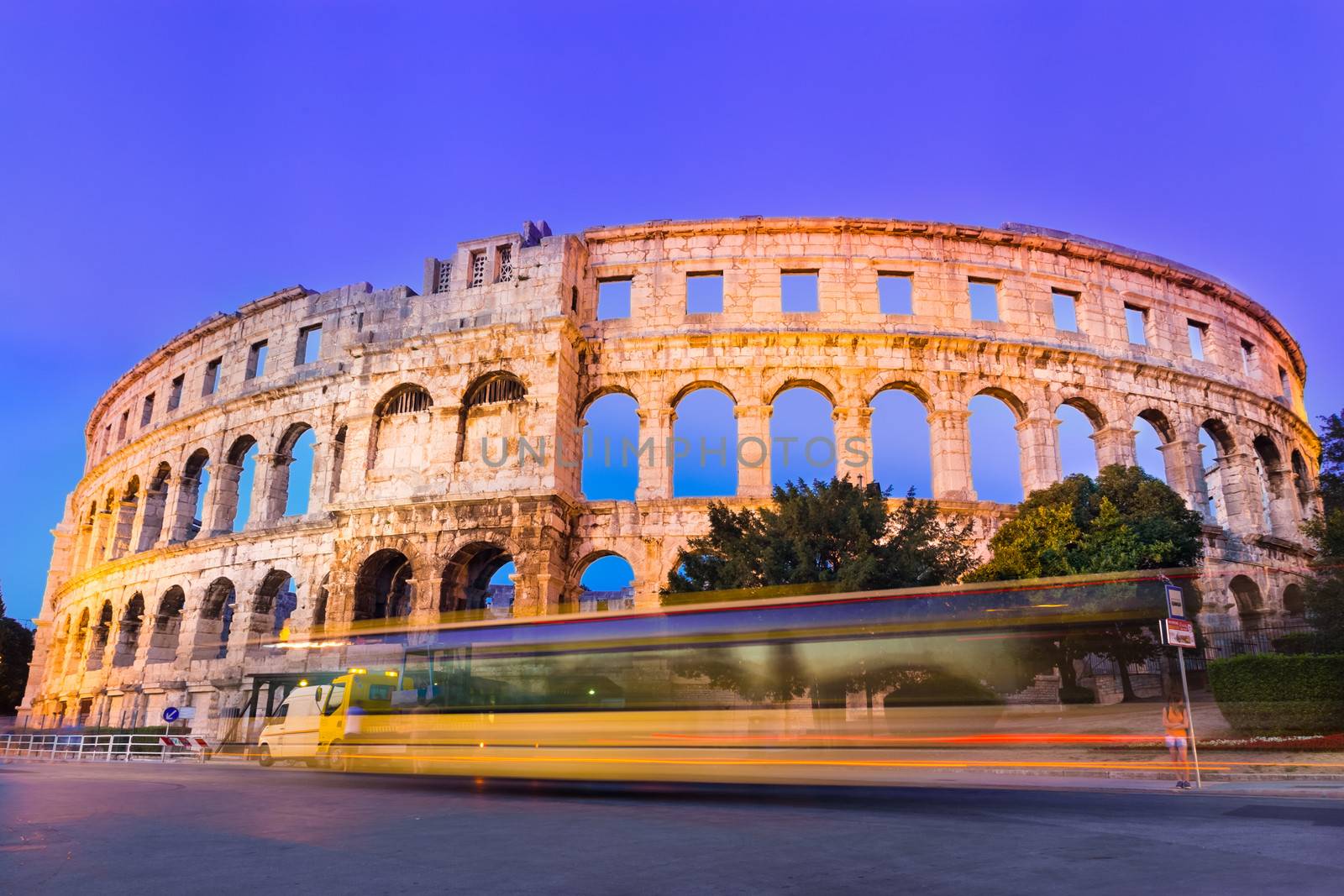 The Roman Amphitheater of Pula, Croatia shot at dusk. It was constructed in 27 - 68 AD and is among the six largest surviving Roman arenas in the World and best preserved ancient monument in Croatia.