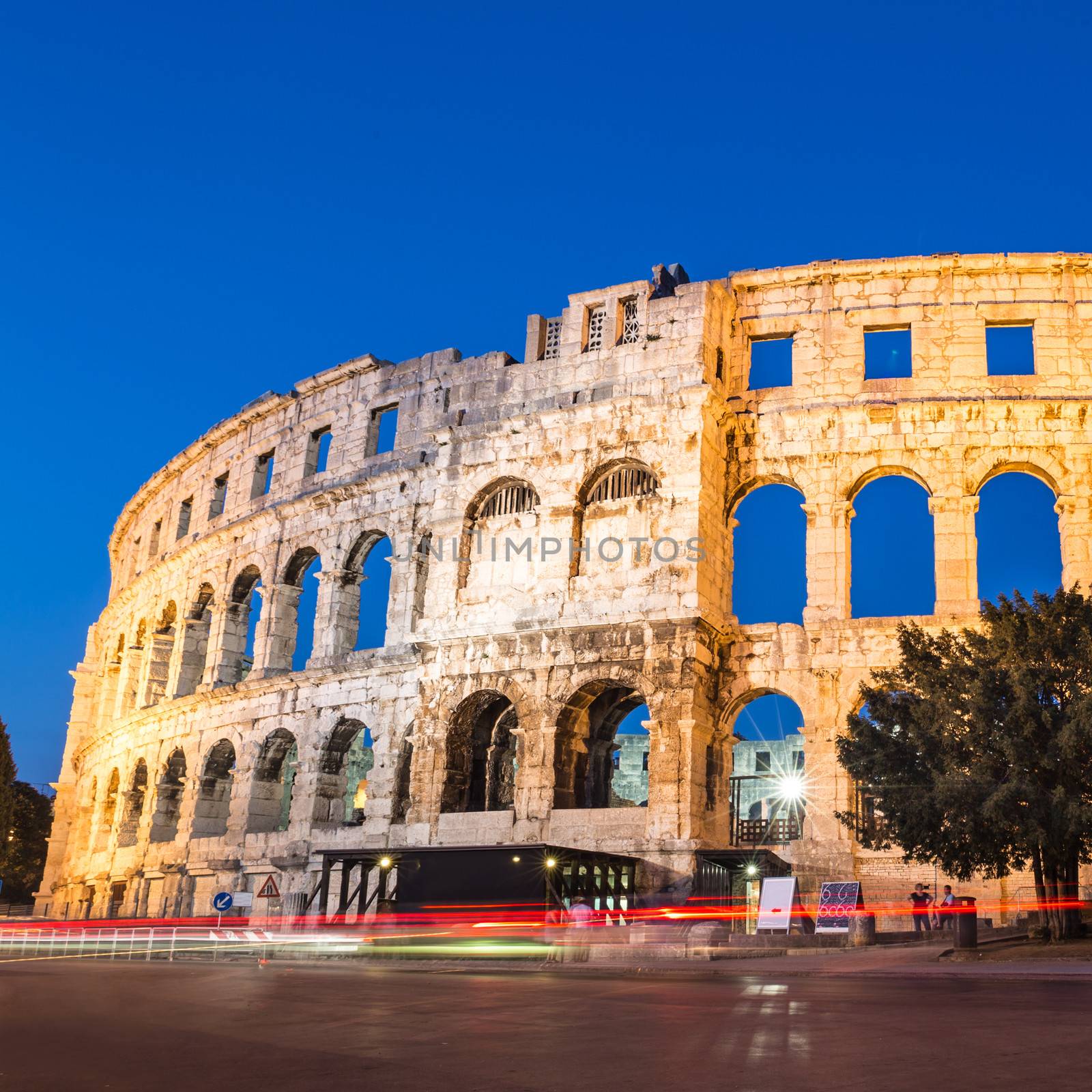 The Roman Amphitheater of Pula, Croatia shot at dusk. It was constructed in 27 - 68 AD and is among the six largest surviving Roman arenas in the World and best preserved ancient monument in Croatia.