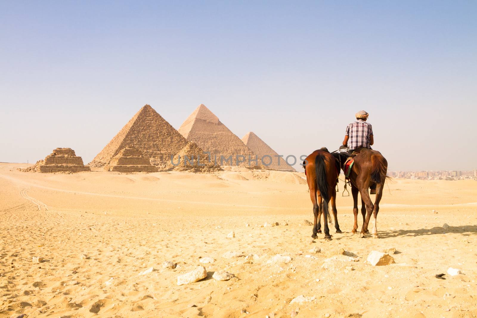 The pyramids of Giza, Cairo, Egypt;  the oldest of the Seven Wonders of the Ancient World, and the only one to remain largely intact.