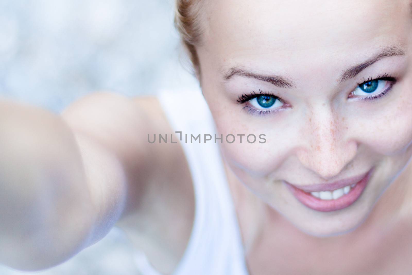 Portrait of a cheerful young woman. by kasto
