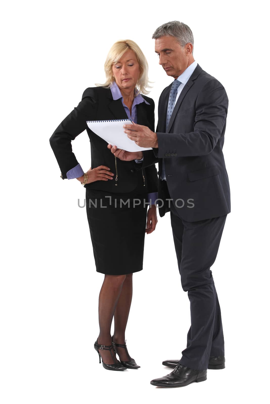 Couple discussing a document