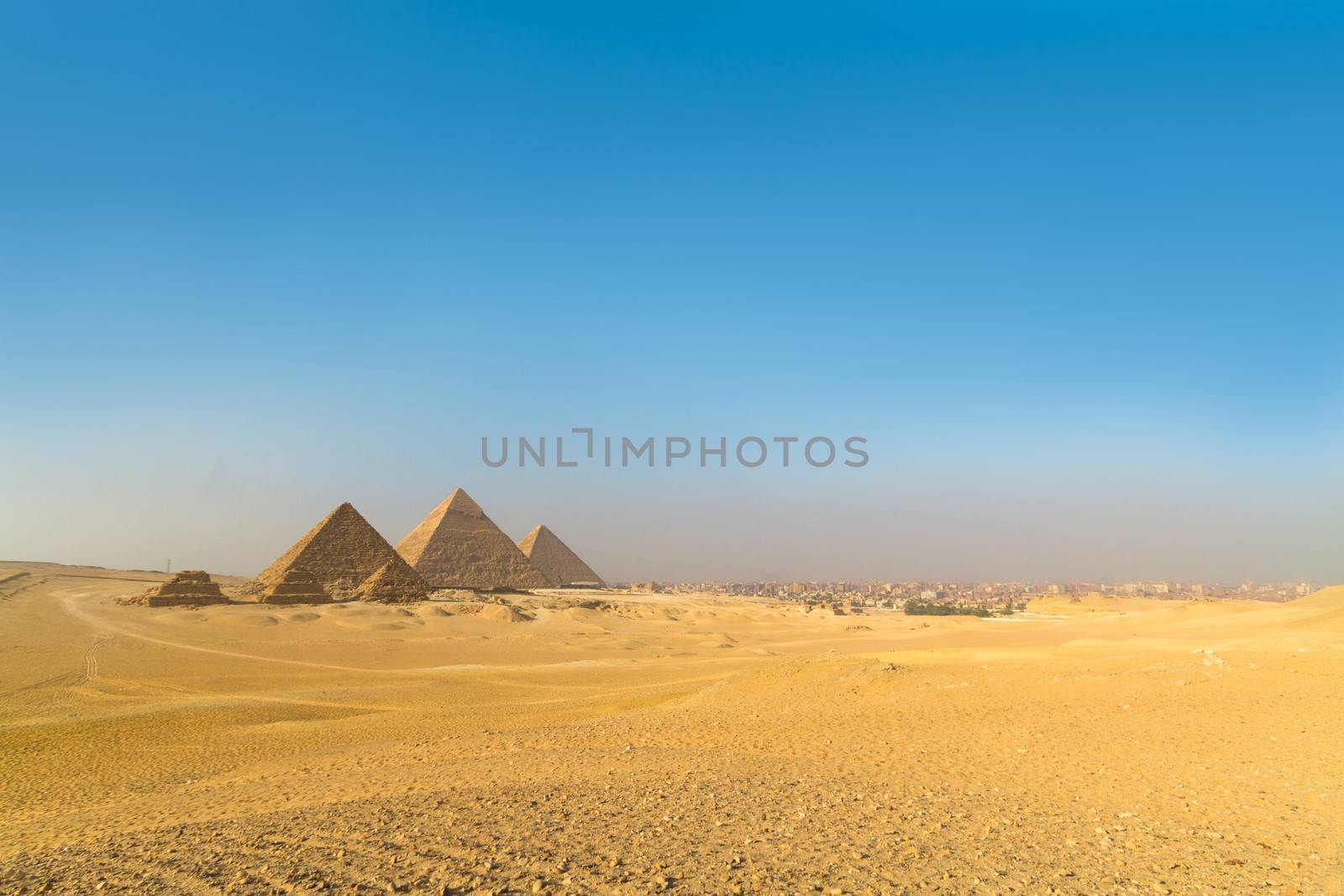 The pyramids of Giza, Cairo, Egypt;  the oldest of the Seven Wonders of the Ancient World, and the only one to remain largely intact
