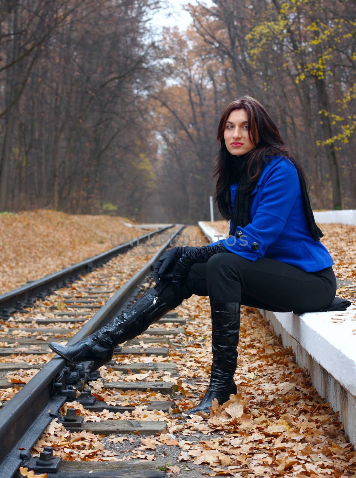 Young woman near the rails by dedmorozz